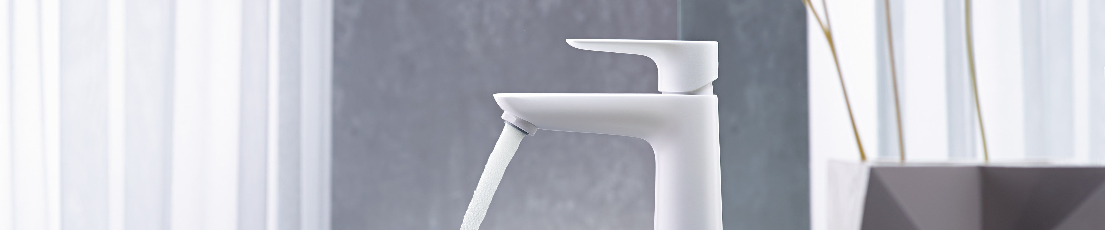 Talis bathroom taps with the intuitive Select push button.